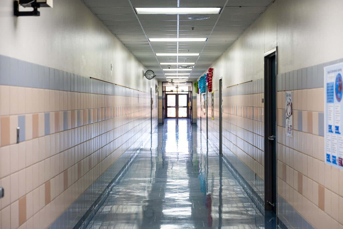 Empty school corridor with a shiny, clean floor